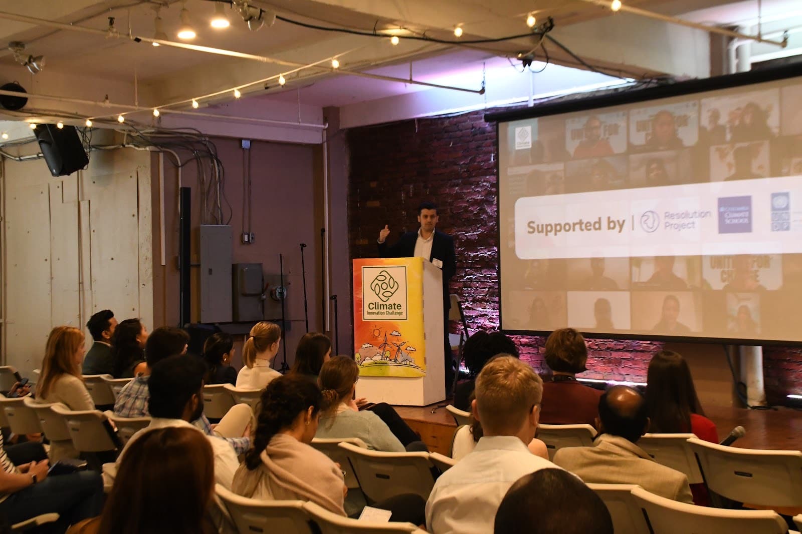 A Climate Week NYC 2024 session with online participants shown on the screen